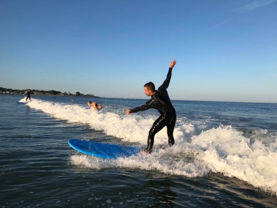 A person surfing a wave.